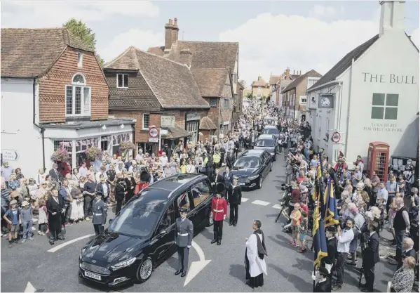  ??  ?? Clockwise from top: the funeral cortege pauses in Ditchling as two Second World War plane performed a flypast; Dame Vera Lynn’s portrait projected on to the White Cliffs of Dover, immortalis­ed in her 1942 recording; Dame Vera’s daughter Virginia Lewis-jones; a recent photograph of the much loved singer