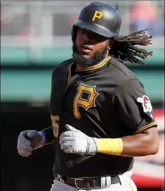  ?? John Minchillo/The Associated Press ?? Josh Bell hit a solo home run off the Cincinnati Reds in the sixth inning of the season’s final game Sunday in Cincinnati.