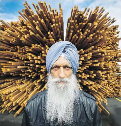  ?? ARLEN REDEKOP ?? Partap Forest Products employee Harbans Singh stands in front of a pile of lumber in Maple Ridge on Tuesday. Partap workers worry that a renewed trade dispute will hurt the company, supervisor C.J. Saini says. “There will be job losses,” he says. “It...