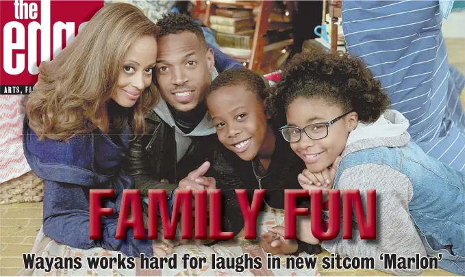  ??  ?? TOGETHERNE­SS: Essence Atkins, Marlon Wayans, Amir O’Neil and Notlim Taylor, from left, star as a family that divorce can’t break apart. Below, Wayans holds on tight.