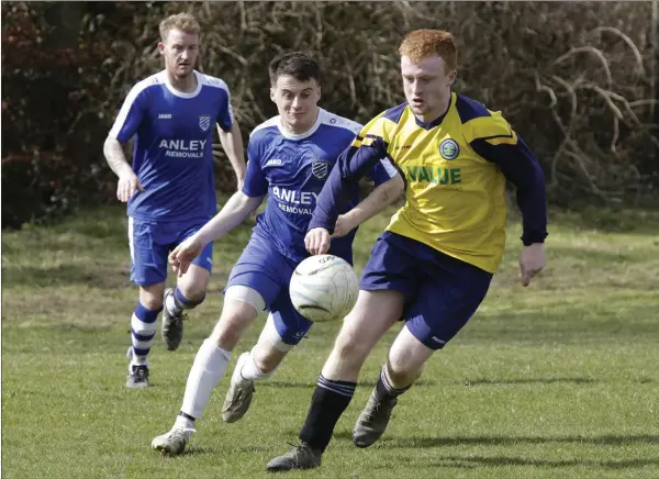  ??  ?? James Delahunty of Glencormac United is tracked by Gavin McDevitt of Ashford Rovers ‘B’.