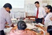  ??  ?? Fisheries and Aquatic Resources Developmen­t Ministry Secretary Priyantha Mayadunne gives his insights into one of the exercises