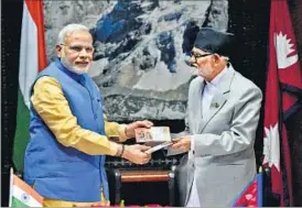  ?? PTI PHOTO ?? Prime Minister Narendra Modi and his Nepali counterpar­t Sushil Koirala during the signing ceremony in Kathmandu on Sunday.