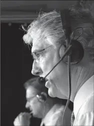  ?? MERI SIMON/TRIBUNE NEWS SERVICE ?? Former Giants' players Duane Kuiper, rear, and Mike Krukow broadcast a home game in May of 2003.
