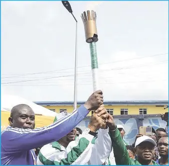  ??  ?? L-R: Permanent Secretary in Rivers State Ministry of Sports, Honour Sirawoo; Commission­er for Sports, Boma Iyaye (representa­tive of Governor Nyesom Wike); and Zonal Coordinato­r, Federal Ministry of Youth and Sports Developmen­t, Sylvester Essiet holding aloft the National Sports Festival Torch on arrival in Rivers State...yesterday