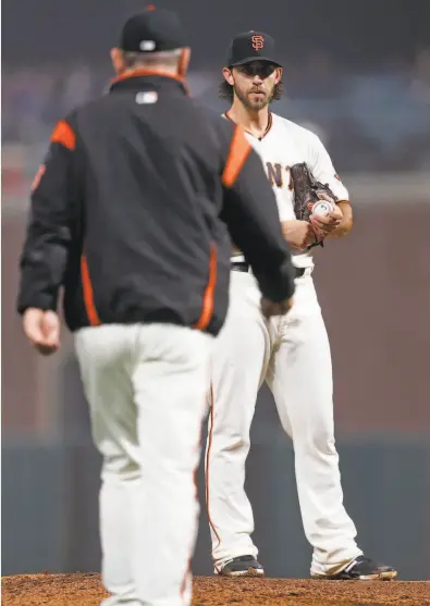  ?? Photos by Scott Strazzante / The Chronicle ?? Threetime World Series champion Madison Bumgarner remains the Giants’ most valuable trade chip.