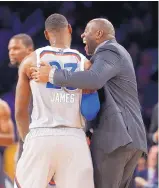  ?? GERALD HERBERT/ASSOCIATED PRESS ?? Magic Johnson talks with LeBron James during Sunday’s NBA All-Star Game. Johnson, a Hall of Fame guard for the Lakers, is “coming back to an organizati­on that I love.”