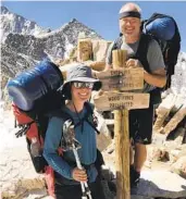  ?? COURTESY PHOTO ?? Barry and Jenny Brown are pictured crossing Kearsarge Pass, a day’s hike off the Pacific Crest Trail, to pick up supplies that their daughter mailed to them in Independen­ce, Calif.