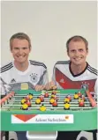  ?? FOTO: MARK MASUCH ?? Die Sportredak­teure Sebastian van Eeck (l.) und Benjamin Post haben die WM im Blick.