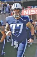  ?? THE ASSOCIATED PRESS ?? Tennessee Titans offensive lineman Taylor Lewan takes the field before a home game against the Houston Texans last December.