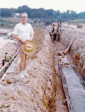  ??  ?? Checking things out: Macken supervisin­g the constructi­on of SPI primary in Taman Bukit Labu in 1979.