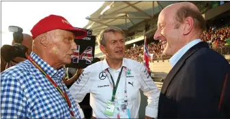  ??  ?? CVC chief Donald Mackenzie (right) meets Niki Lauda during the investment house’s time in charge of Formula One