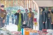  ?? ANI ?? Major Agnes P Menezes (retd), wife of late Lt Colonel Harjinder Singh, one of the 13 victims of the IAF chopper crash, pays her last respects at the cremation in New Delhi on Sunday.