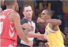  ?? — USA Today Sports ?? Los Angeles Lakers guard Rajon Rondo (9) throws a punch at Houston Rockets guard Chris Paul (3) during a fight in the fourth quarter of the game at Staples Center.