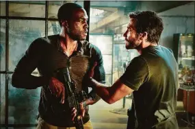  ?? Andrew Cooper / Universal Pictures ?? Yahya Abdul-Mateen II, left, and Jake Gyllenhaal in “Ambulance.”