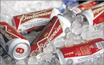  ?? GENE J. PUSKAR ASSOCIATED PRESS 2015 ?? Budweiser maker Anheuser-Busch InBev’s takeover of SABMiller was approved by SABMiller shareholde­rs.