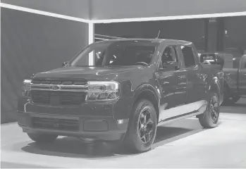  ?? SCOTT OLSON/GETTY ?? A new Ford Maverick truck is introduced to the media at the Chicago Auto Show on July 14.