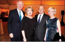  ?? NWA Democrat-Gazette/CARIN SCHOPPMEYE­R ?? Gov. Asa Hutchinson and wife Susan (from left) and Mark and Vicki Saviers attend the Arkansas Children’s Northwest celebratio­n.