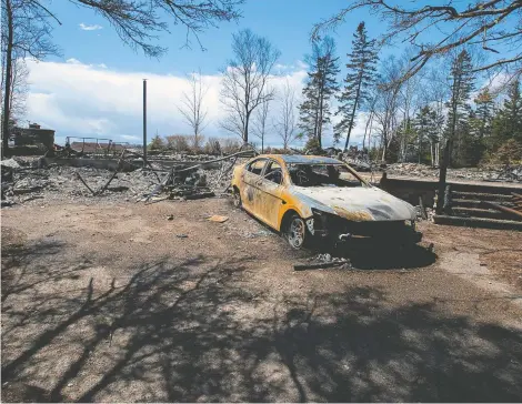  ?? ANDREW VAUGHAN / THE CANADIAN PRESS FILES ?? A fire-destroyed property registered to Gabriel Wortman at 200 Portapique Beach Road is seen on May 8, 2020, in Portapique, N.S.