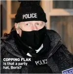  ?? ?? COPPING FLAK Is that a party hat, Boris?