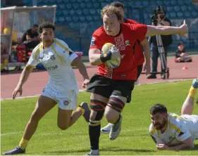  ?? ?? Owen Vassallo (centre) powers his way through against Cyprus. PHOTO: STEPHANIE WELCH