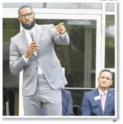  ?? FILE PHOTO ?? LeBron James speaks at the opening of the school in Akron, Ohio, Monday. The school is supported by the The LeBron James Family Foundation and is run by the Akron Public Schools.