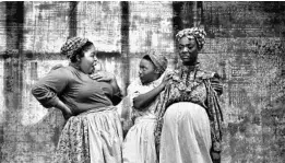  ?? COURTESY OF THEATRE UCF ?? From left, Waneka Leary and Reva Stover, with fellow cast member Bria Holloway, enliven the Theatre UCF production of “An Octoroon” with their portrayal of sassy slaves.