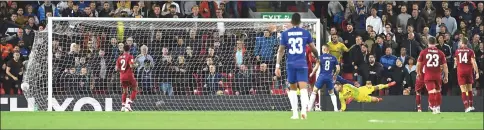  ??  ?? Liverpool’s Belgian goalkeeper Simon Mignolet watches the ball into the net as Chelsea’s Belgian midfielder Eden Hazard (unseen) scores his team’s second goal during the English League Cup third round football match between Liverpool and Chelsea at Anfield in Liverpool, north west England. — AFP photo