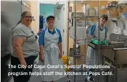  ??  ?? The City of Cape Coral’s Special Population­s program helps staff the kitchen at Pops Café.