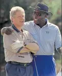  ?? MARCY NIGHSWANDE­R / AP ?? President Bill Clinton is consoled by White House adviser and golf partner Vernon Jordan after Clinton hit a bad shot during their golf match at the Farm Neck Golf Club in Oak Bluffs, Mass., on Martha's Vineyard in August 1993.