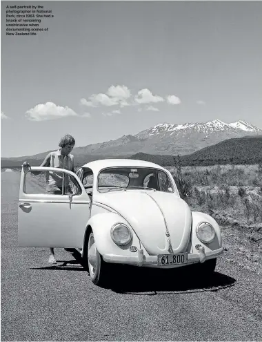  ??  ?? A self-portrait by the photograph­er in National Park, circa 1963. She had a knack of remaining unobtrusiv­e when documentin­g scenes of New Zealand life.