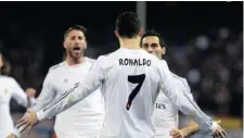  ?? GERARD JULIEN/Getty Images ?? Real Madrid is enjoying success in the Champions League playdowns
despite the absence of suspended star forward Cristiano Ronaldo.