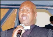  ?? ( Pics: Sibusiso Shange) ?? Reverend Sabelo Sibandze praying for the country’s authoritie­s.