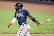  ?? LYNNE SLADKY/ASSOCIATED PRESS FILE ?? Marcell Ozuna’s four-year, $65 million deal to return to the Atlanta Braves was likely compromise­d by the timing of his breakout season — when a pandemic broke out.