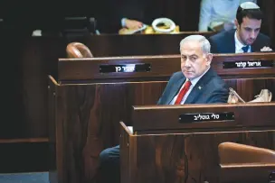  ?? (Arie Leib Abrams/Flash90) ?? PRIME MINISTER Benjamin Netanyahu sits in the Knesset plenum, earlier this week. Operation Shield and Arrow fell short of his claims of a new equation against Islamic Jihad and Hamas in the Gaza Strip, says the writer.