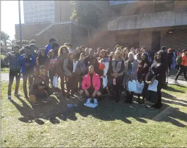  ?? CONTRIBUTE­D ?? Clayton County students take a break during a tour this year at Benedict College in South Carolina. Benedict is one of three HBCUs that partner with Clayton County to get more of the district’s kids enrolled in college.