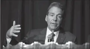  ?? The Associated Press ?? BAMA BOOST: Alabama head football coach Nick Saban speaks July 18 during the ceremony for the acceptance of The MacArthur Bowl trophy during the Southeaste­rn Conference’s football media days at the College Football Hall of Fame in Atlanta.