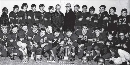  ??  ?? The 1968 Maritime midget football champion Truro Trojans, front row, from left, Gordie Muir, Casey Powers, Billy MacDougall, Robert Macmillan, Mike Swail, Mort Schurman, Harold Purdy, Paul Price, Danny Goodspeed, Tom Cale and Don Mackinnon. Second row, Butch Byard, Dave Fulton, Blair Maceachern, Doug Conrad, Terry Mcintyre, Dave Conrad, coach Lik Macdonald, coach Gerry Ritcey, Byron Wilson, Terry Wilkinson, Davis Daurie, Tom Burlock, Steve Johnson and Eric Maine. Missing from photo coach Pat Saxton.