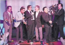  ?? STEVE SPATAFORE ?? Vegas showmen Nelson Sardelli, from left, Clint Holmes, Dennis Bono, Bob Anderson, Frankie Scinta and Jerry Tiffe kick it up during “Mama Maria” Perry’s 100th birthday bash Monday night at the Copa Room at the Bootlegger Bistro.