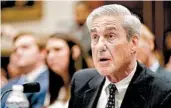  ?? CHIP SOMODEVILL­A/GETTY ?? Robert Mueller testifies Wednesday before a House panel. He said the nearly two-year probe was “not a witch hunt.”