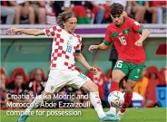  ?? ?? Croatia’s Luka Modric and Morocco’s Abde Ezzalzouli compete for possession