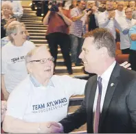  ?? MITCH MACDONALD/THE GUARDIAN ?? Hubert McIsaac Sr. shakes hands with PC leadership hopeful James Aylward shortly before the Stratford-Kinlock MLA’s announceme­nt to enter the race. Aylward announced his bid Tuesday night in front of more than 200 supporters at Florence Simmons...