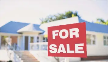  ?? Martin Barraud / Getty Images ?? Low inventory has driven up the price of homes on the market in the region, according to data from the Greater Capital Associatio­n of Realtors.