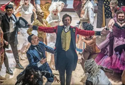  ?? PHOTO BY NIKO TAVERNISE ?? See Hugh Jackman bring P.T. Barnum to life in “The Greatest Showman” during Screen on the Green in downtown West Palm Beach. 1.