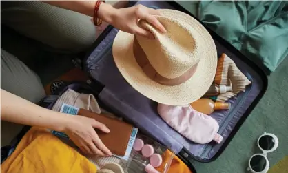  ?? Photograph: AnnaStills/Getty Images/iStockphot­o ?? In the bag ... ‘What proportion of your holiday clothes should be non-elasticate­d?’