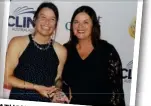  ?? ?? KATHRYN
Robertson from Carnival Australia presents the Cruise Consultant of the Year - New Zealand award to Janine Mallon from Zest4Trave­l.