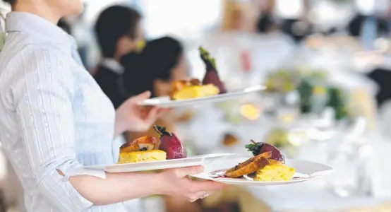  ?? SHRINKING APPETITES: The hospitalit­y sector is at a record low as dining- out spending falls. ??