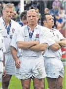  ??  ?? Dublin dejection: Healey (right) with Neil Back (centre) and Lewis Moody