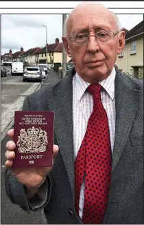  ??  ?? National identity: John Warman with his passport
