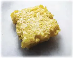  ?? ?? These tart lemon bars incorporat­e whole lemons, albeit blended, instead of just lemon juice or grated rind.